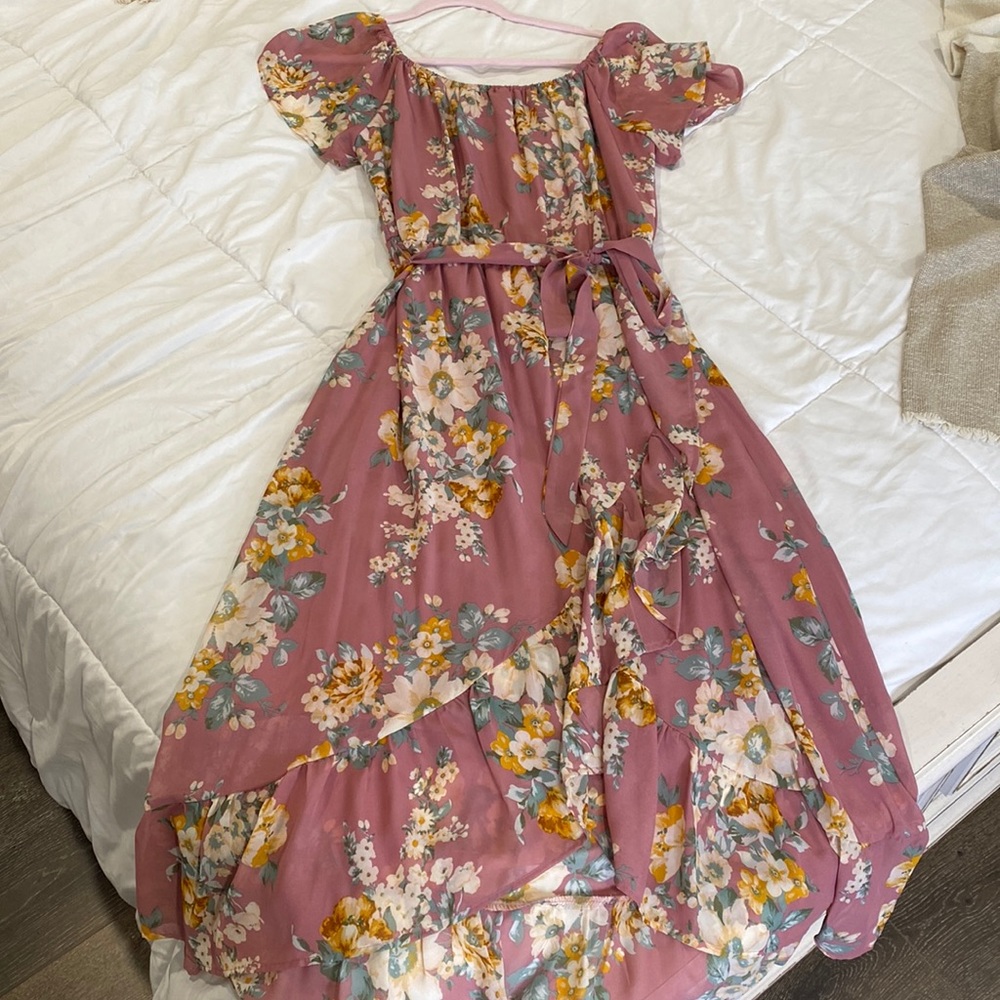 Robert Luis floral dress that has a crossover body style.